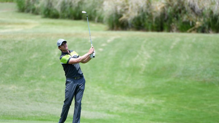 BEL OMBRE, MAURITIUS - DECEMBER 01:  Laurie Canter of England plays his second shot on the 9th during day two of the AfrAsia Bank Mauritius Open at Heritag
