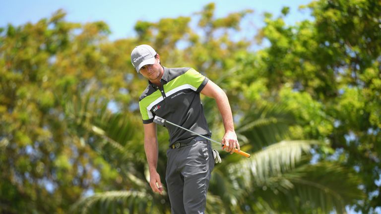 BEL OMBRE, MAURITIUS - DECEMBER 01:  Laurie Canter of England reacts after his putt on the 7th during day two of the AfrAsia Bank Mauritius Open at Heritag
