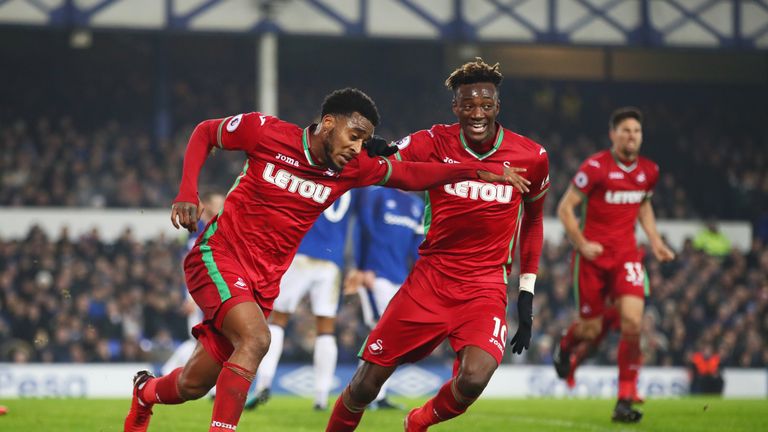 LIVERPOOL, ENGLAND - DECEMBER 18:  Leroy Fer of Swansea City (L) celebrates as he scores their first goal with Tammy Abraham during the Premier League matc