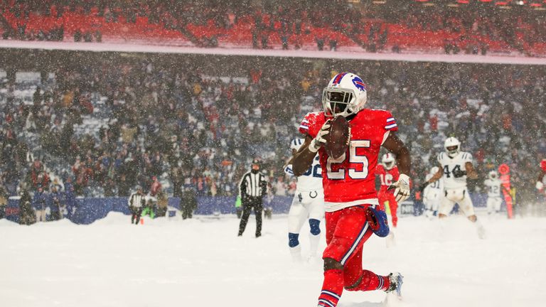 ORCHARD PARK, NY - DECEMBER 10:  LeSean McCoy #25 of the Buffalo Bills scores a touchdown to win the game during overtime against the Indianapolis Colts on