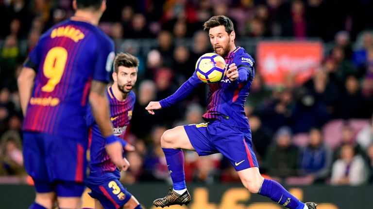 Lionel Messi controls the ball on his chest during the La Liga against Deportivo de la Coruna