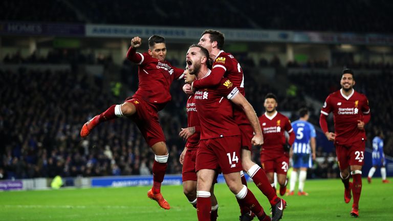 Jordan Henderson of Liverpool celebrates after Philippe Coutinho scores against Brighton