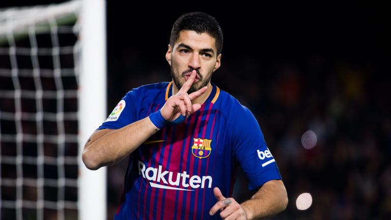 Luis Suarez celebrates after scoring Barcelona's third goal in the 4-0 win over Deportivo La Coruna