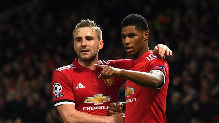 MANCHESTER, ENGLAND - DECEMBER 05:  Marcus Rashford of Manchester United celebrates after scoring his sides second goal with Luke Shaw of Manchester United