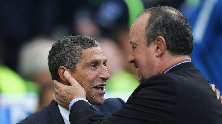 Chris Hughton, Manager of Brighton and Hove Albion and Rafael Benitez, Manager of Newcastle United greet each other