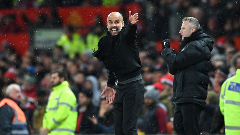 Pep Guardiola reacts during the Manchester derby at Old Trafford