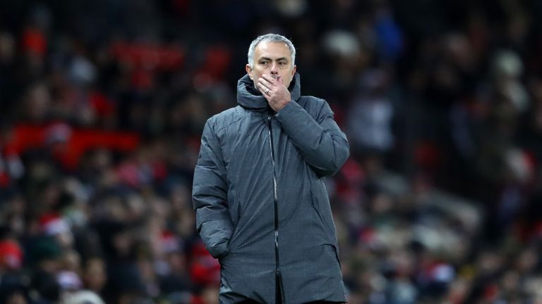 Jose Mourinho looks on with his side 2-1 down in the Manchester derby