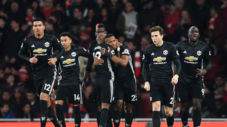 Antonio Valencia of Manchester United celebrates after scoring his sides first goal with Ashley Young of Manchester United 