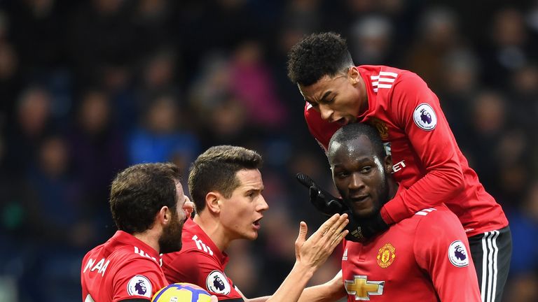 WEST BROMWICH, ENGLAND - DECEMBER 17:  Romelu Lukaku of Manchester United celebrates after scoring his sides first goal with teammates Juan Mata, Ander Her