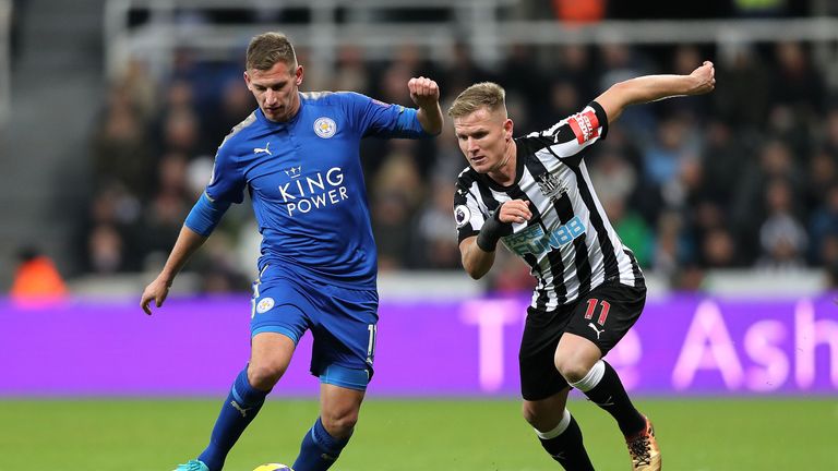 Leicester City's Marc Albrighton (left) and Newcastle United's Matt Ritchie (right) battle for the ball during the Premier League match at St James' Park