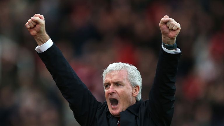 Mark Hughes celebrates Stoke's first goal in the 3-1 win over West Brom