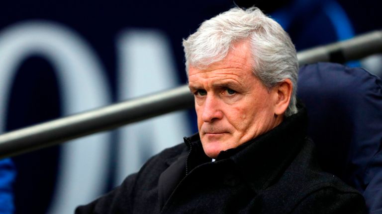 Stoke City's Welsh manager Mark Hughes awaits kick off in the English Premier League football match between Tottenham Hotspur and Stoke City at Wembley Sta