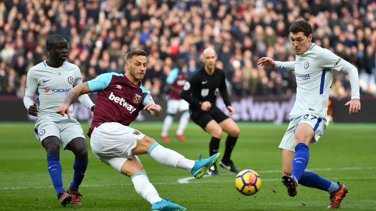 Marko Arnautovic of West Ham United shoots as Andreas Christensen of Chelsea attempts to block during the Premier League match