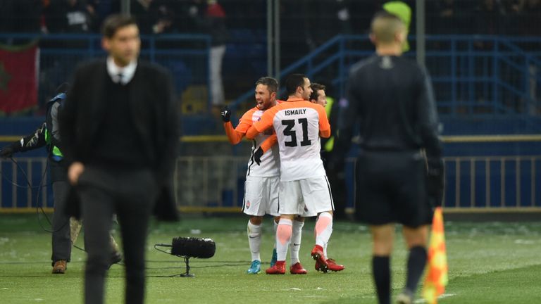 Shakhtar Donetsk's Brazilian midfielder Marlos (1st-L) celebrate a goal of his teammate Shakhtar Donetsk's Brazilian midfielder Bernard (1st-R) during the 