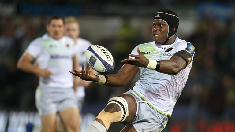 NORTHAMPTON, ENGLAND - OCTOBER 15:  Maro Itoje of Saracens off loads the ball as Cobus Reinach tackles during the European Rugby Champions Cup match betwee
