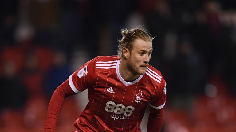 NOTTINGHAM, ENGLAND - DECEMBER 09: Matt Mills of Nottingham Forest on the ball during the Sky Bet Championship match between Nottingham Forest and Bolton W