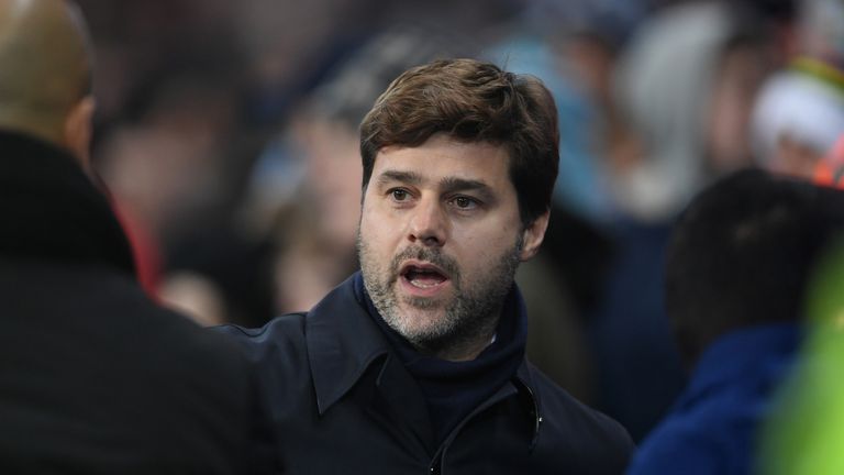 Mauricio Pochettino looks on during Tottenham's defeat to Man City