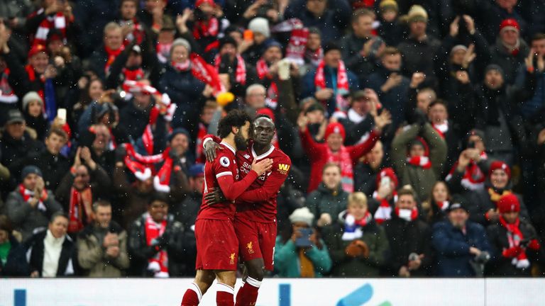 Mohamed Salah celebrates hisl goal with team-mate Sadio Mane