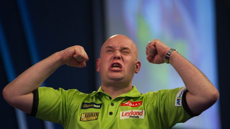 Michael van Gerwen celebrates after his victory in the PDC World Championship darts final over Scotland's Gary Anderson at Alexandra Palace
