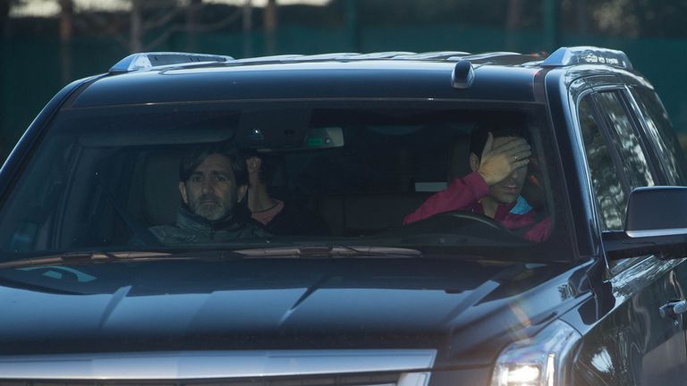 Manchester City's Mikel Arteta covers his face as he arrives for training 