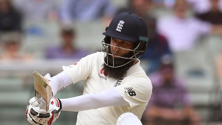 England's batsman Moeen Ali hooks a ball away from the Australian bowling on the third day of the fourth Ashes cricket Test match at the MCG in Melbourne o