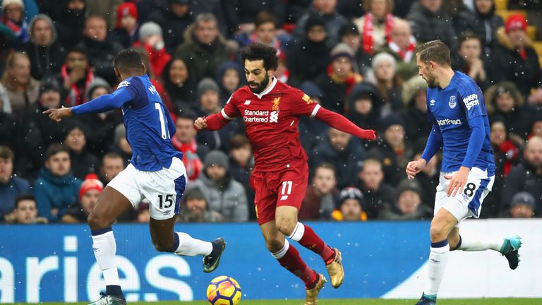 Mohamed Salah takes on Gylfi Sigurdsson and Cuco Martina