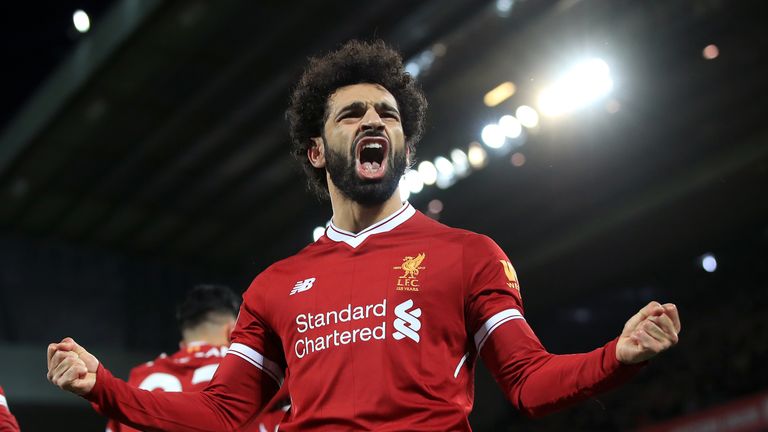 Mohamed Salah celebrates scoring Liverpool's second goal  against Leicester