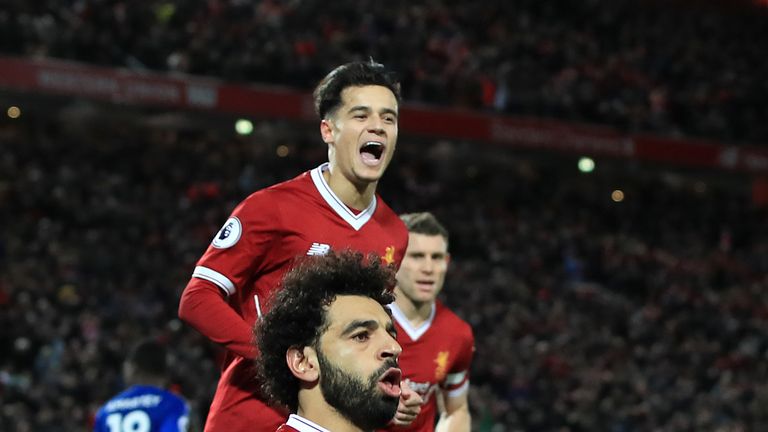 Mohamed Salah celebrates scoring his side's second goal during the Premier League match at Anfield, Liverpool.