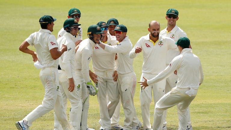 Nathan Lyon of Australia celebrates the wicket of Joe Root of England during day four of the Third Test