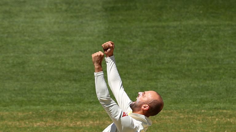 Nathan Lyon celebrates dismissing Moeen Ali during day five of the second Ashes test match