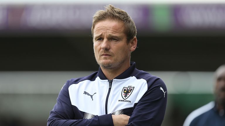 NORTHAMPTON, ENGLAND - OCTOBER 14:  AFC Wimbledon manager Neal Ardley looks on during the Sky Bet League One match between Northampton Town and A.F.C. Wimb