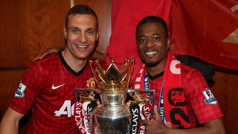 Nemanja Matic and Patrice Evra at Old Trafford on May 12, 2013 in Manchester, England.