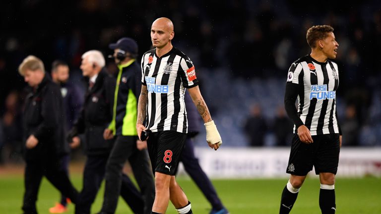 Jonjo Shelvey and Dwight Gayle look dejected following defeat to Burnley at Turf Moor