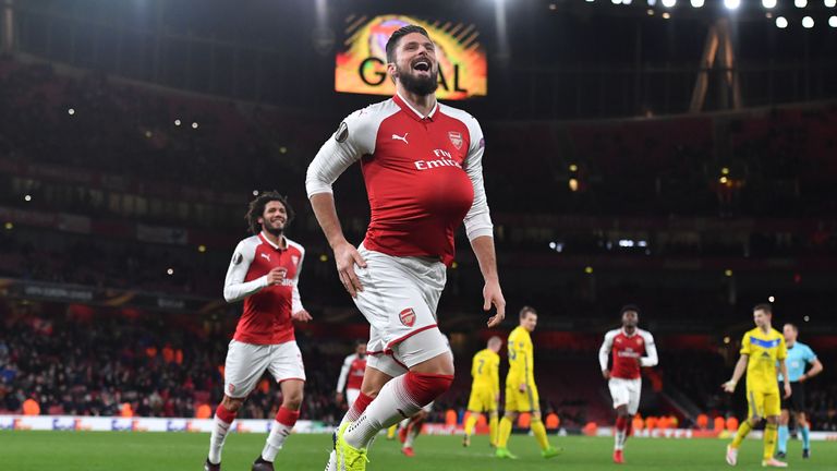 Olivier Giroud celebrates after scoring Arsenal's fifth from the spot 