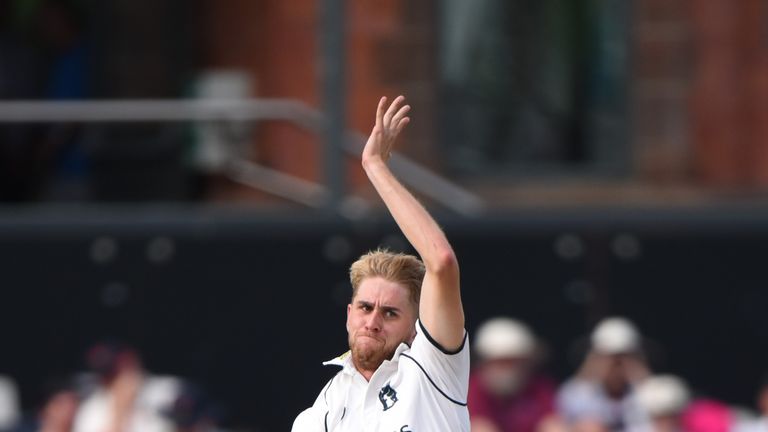 MANCHESTER, ENGLAND - AUGUST 28 : Olly Stone of Warwickshire runs into bowl during the County Championship Division One match between Lancashire and Warwic