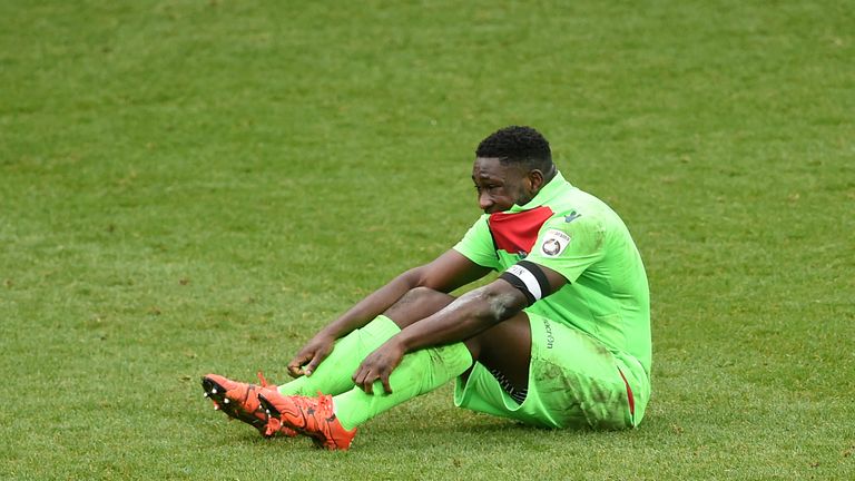 Oxford City's Godfrey Poku dejected after the match