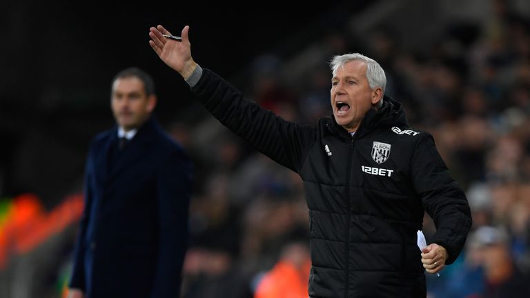SWANSEA, WALES - DECEMBER 09:  WBA manager Alan Pardew reacts as Paul Clement looks on during the Premier League match between Swansea City and West Bromwi