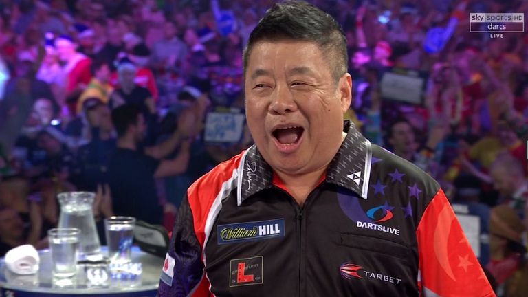 Paul Lim reacts to his attempt at a nine-darter on day 9 of the WDC