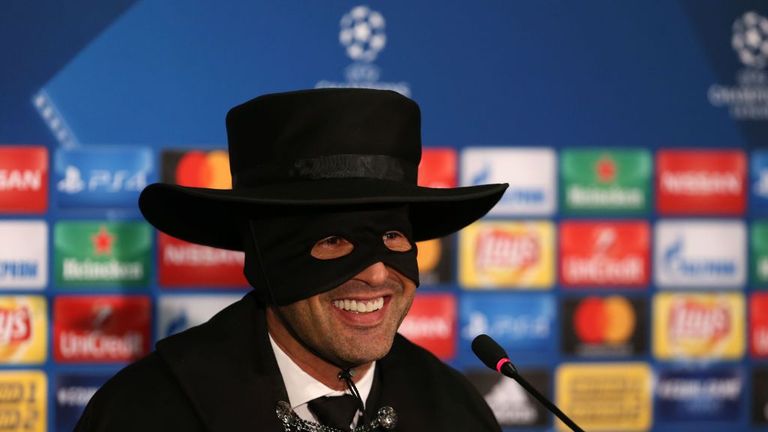 Shakhtar Donetsk's Portuguese manager Paulo Fonseca dons a Zorro mask, cape and hat