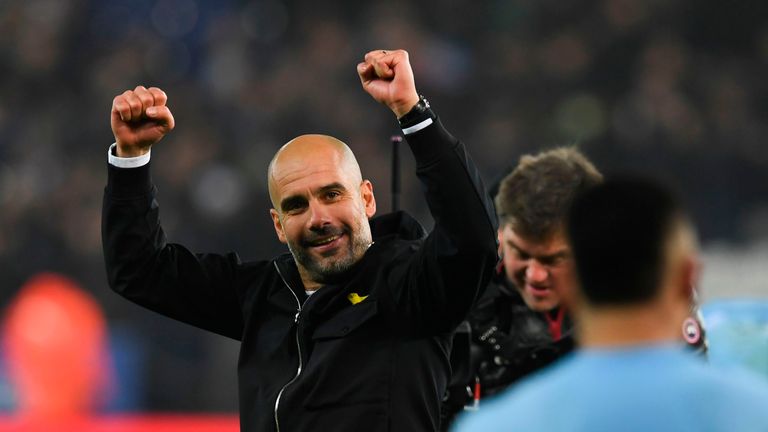 Pep Guardiola celebrates on the pitch after the penalty shoot out victory over Leicester City in the Carabao Cup Quarter-Final