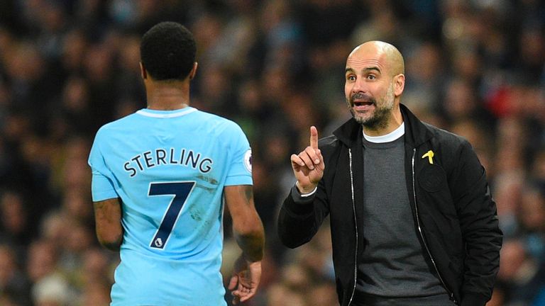 Pep Guardiola speaks to Raheem Sterling during the Premier League match against Bournemouth