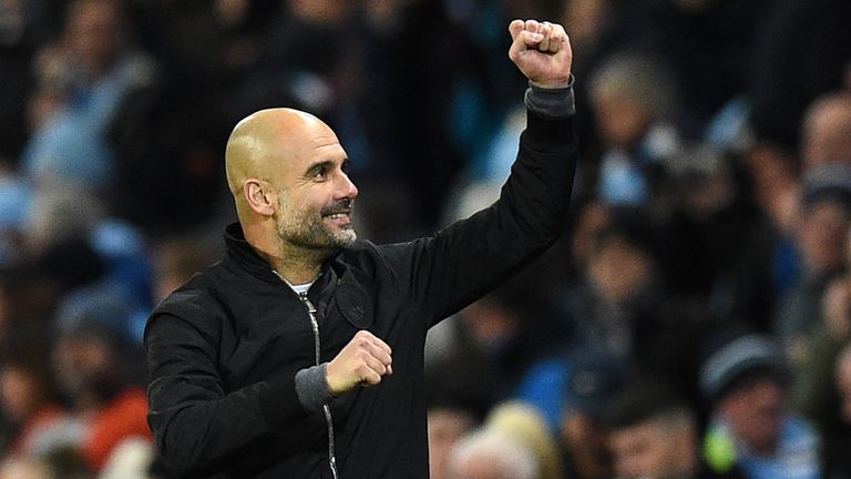 Manchester City's Spanish manager Pep Guardiola celebrates their win on the final whistle in the English Premier League football match between Manchester C