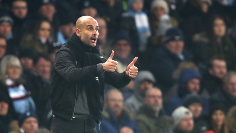 Pep Guardiola gives his team instructions against Tottenham