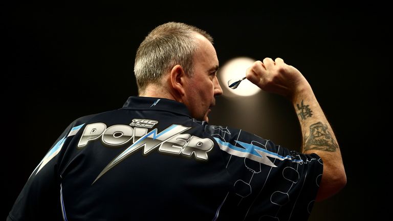 LONDON, ENGLAND - DECEMBER 19:  Phil Taylor of England in action during his first round match against Jyhan Artut of Germany on Day Two of the William Hill