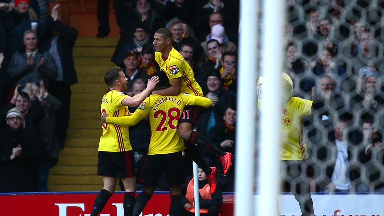 Andre Carrilo of Watford celebrates with team-mates after scoring his sides first goal