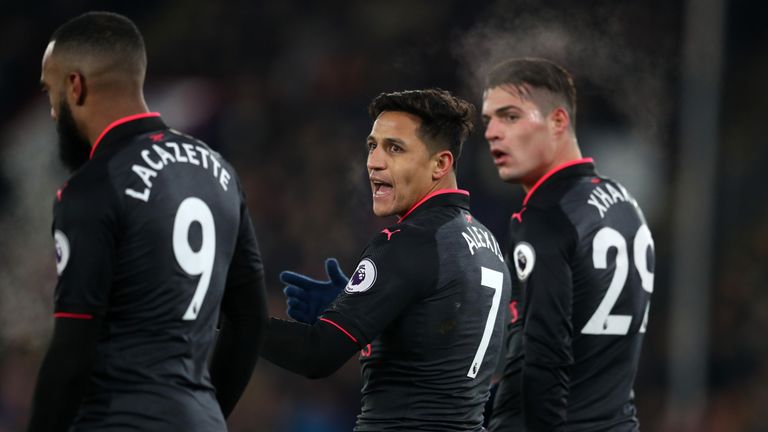 LONDON, ENGLAND - DECEMBER 28: Alexis Sanchez of Arsenal talks to Alexandre Lacazette of Arsenal during the Premier League match between Crystal Palace and