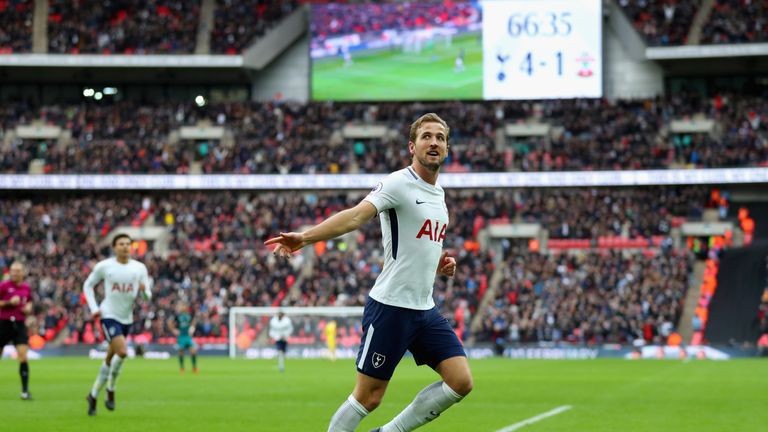 Harry Kane celebrates after completing his hat-trick