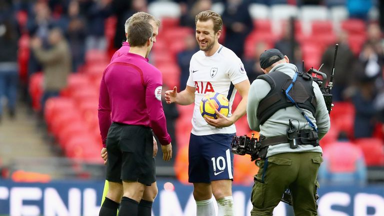 Harry Kane collects the match ball after Tottenham's 5-2 victory over Southampton