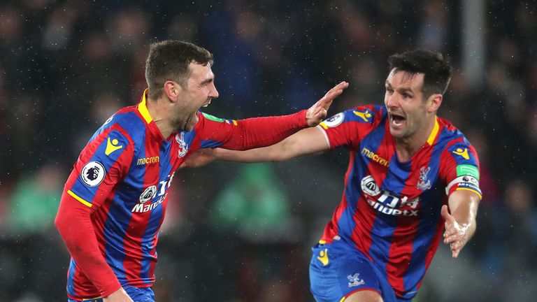 James McArthur with Scott Dann after making it 2-1 to Crystal Palace in the final moments of the game