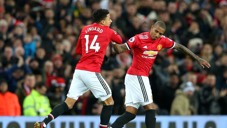 Jesse Lingard celebrates with Ashley Young after pulling a goal back for Manchester United